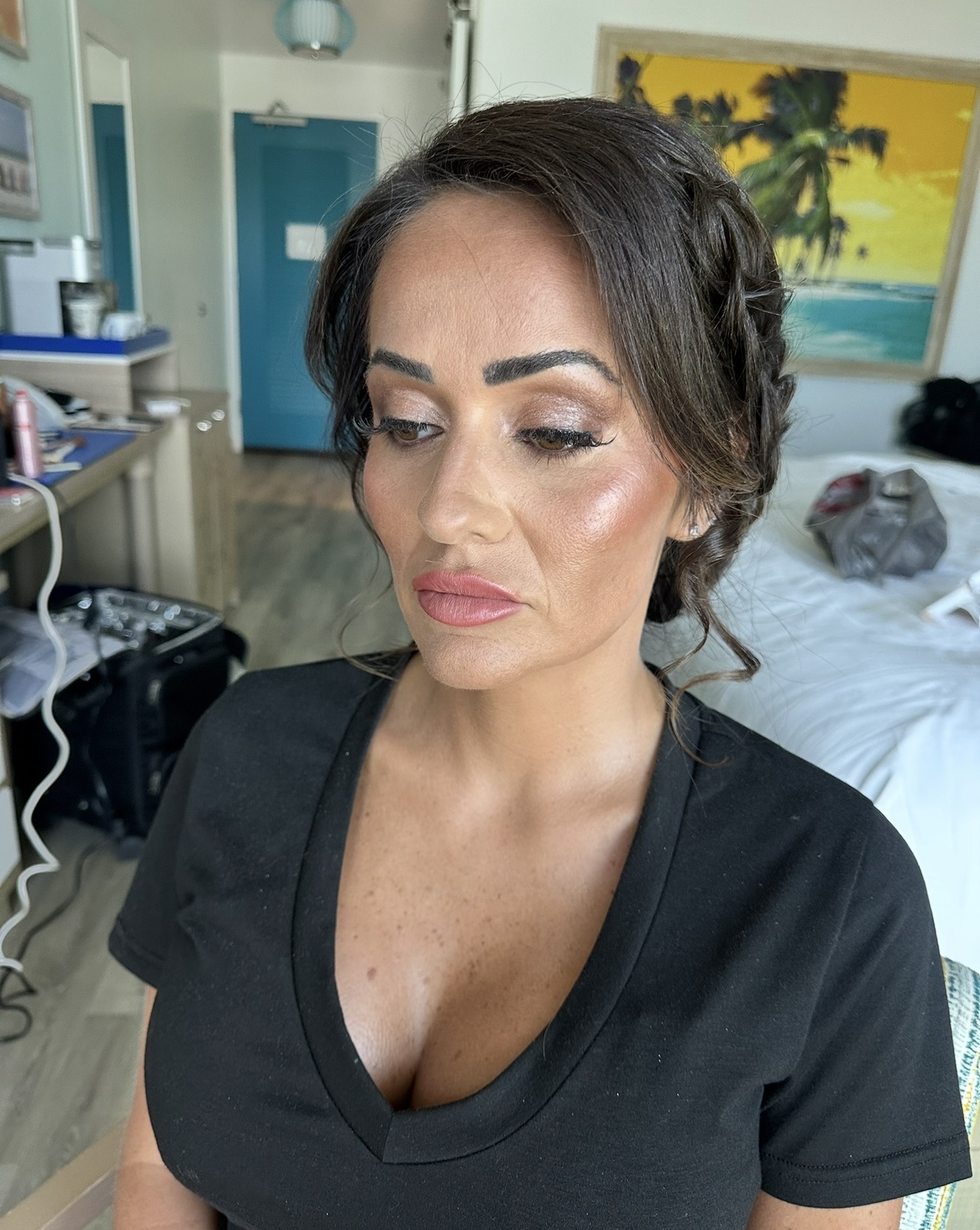 Glowing bronzed glam with soft updo