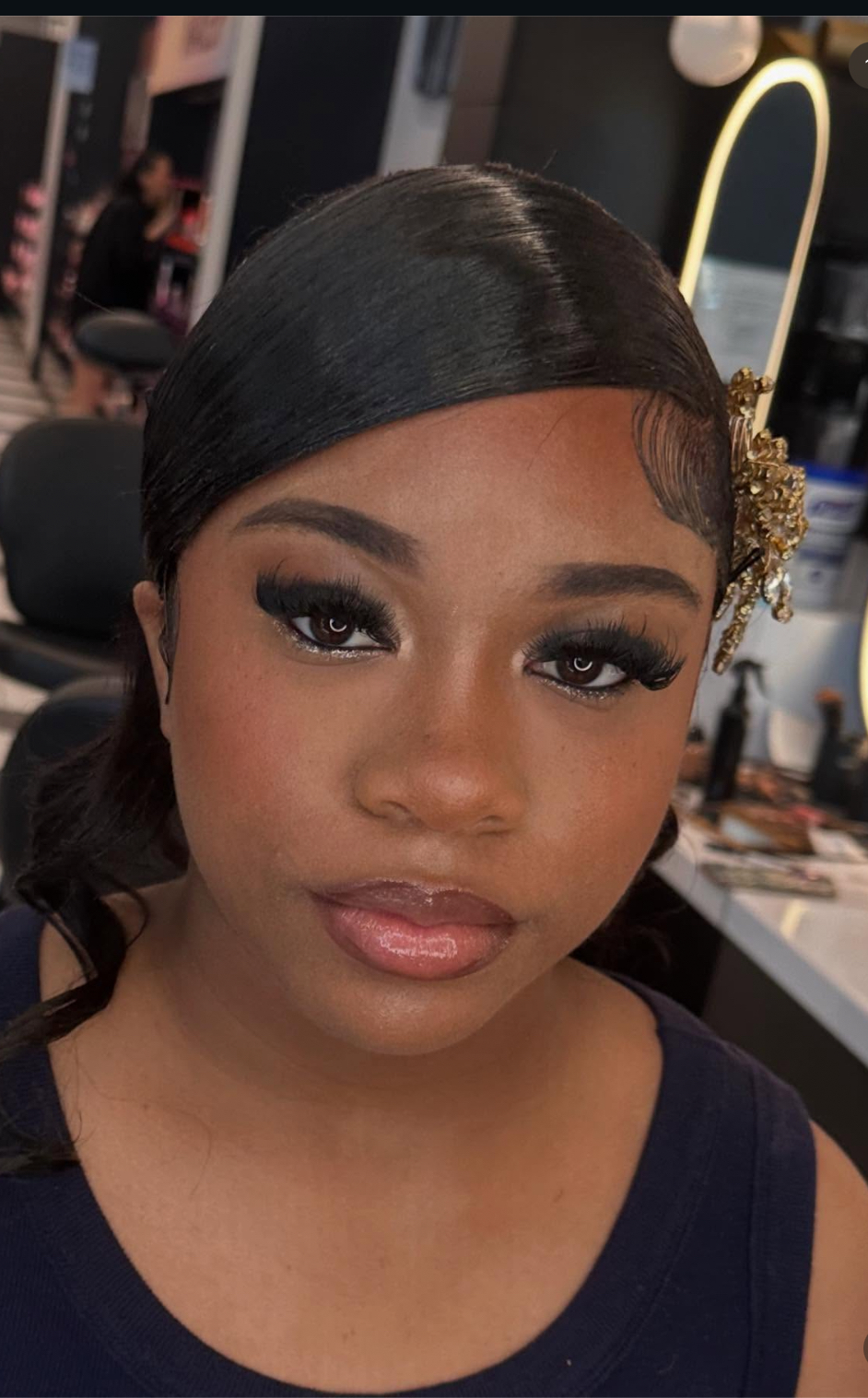 Sleek bridal glam with jeweled accessory