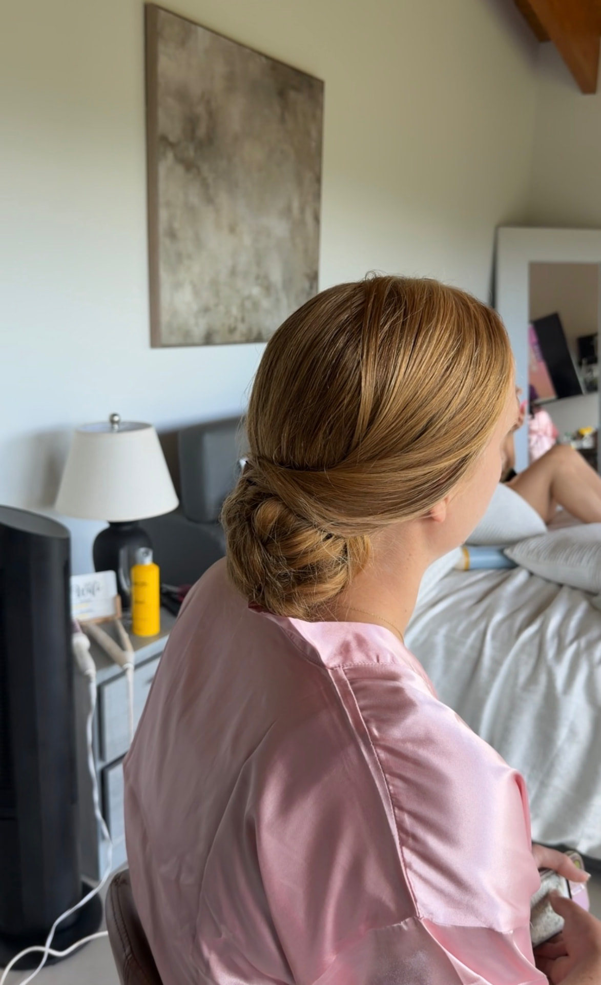 Polished low chignon bridal updo