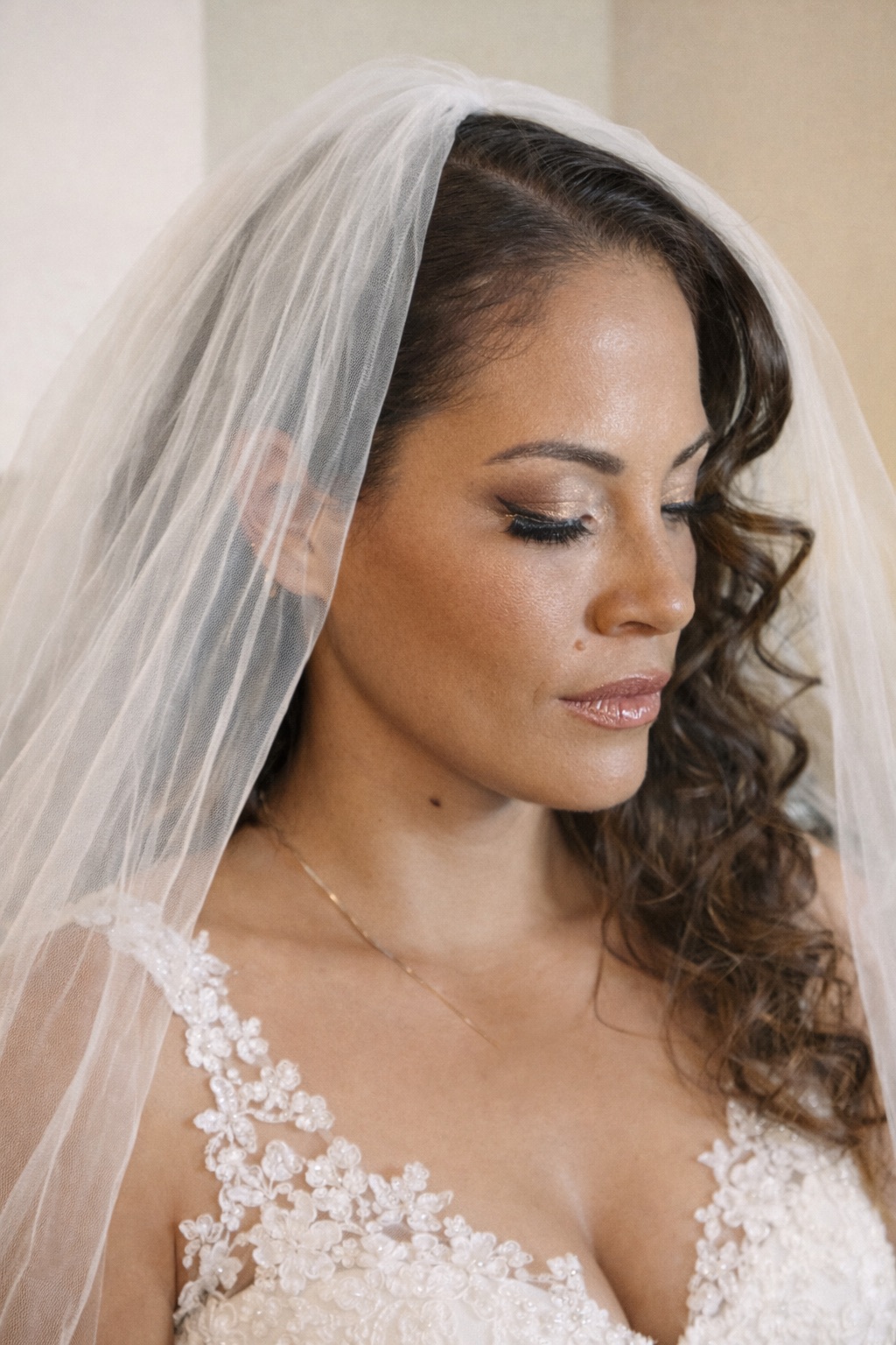 Radiant bridal glam with veil