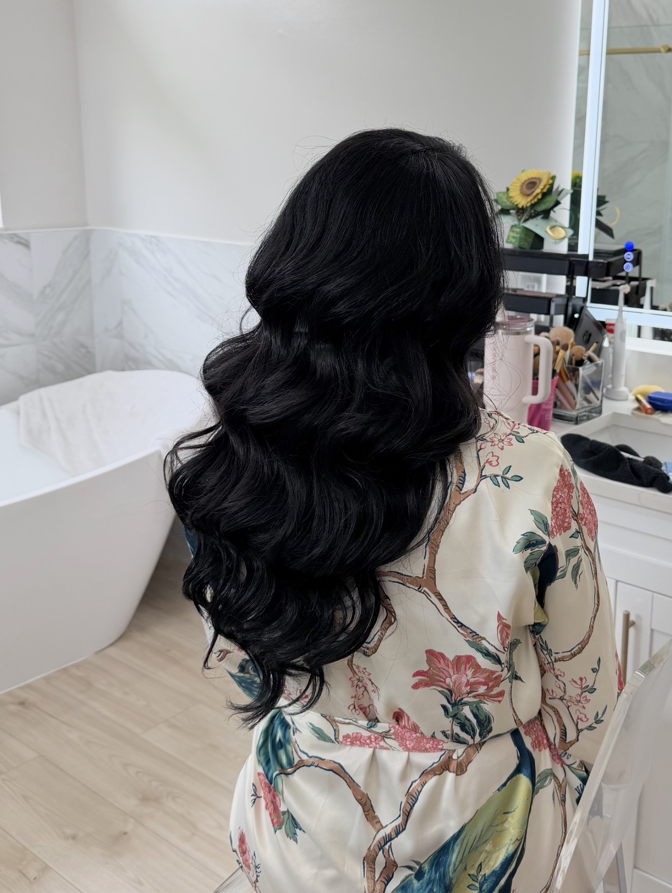 Long glossy black Hollywood waves