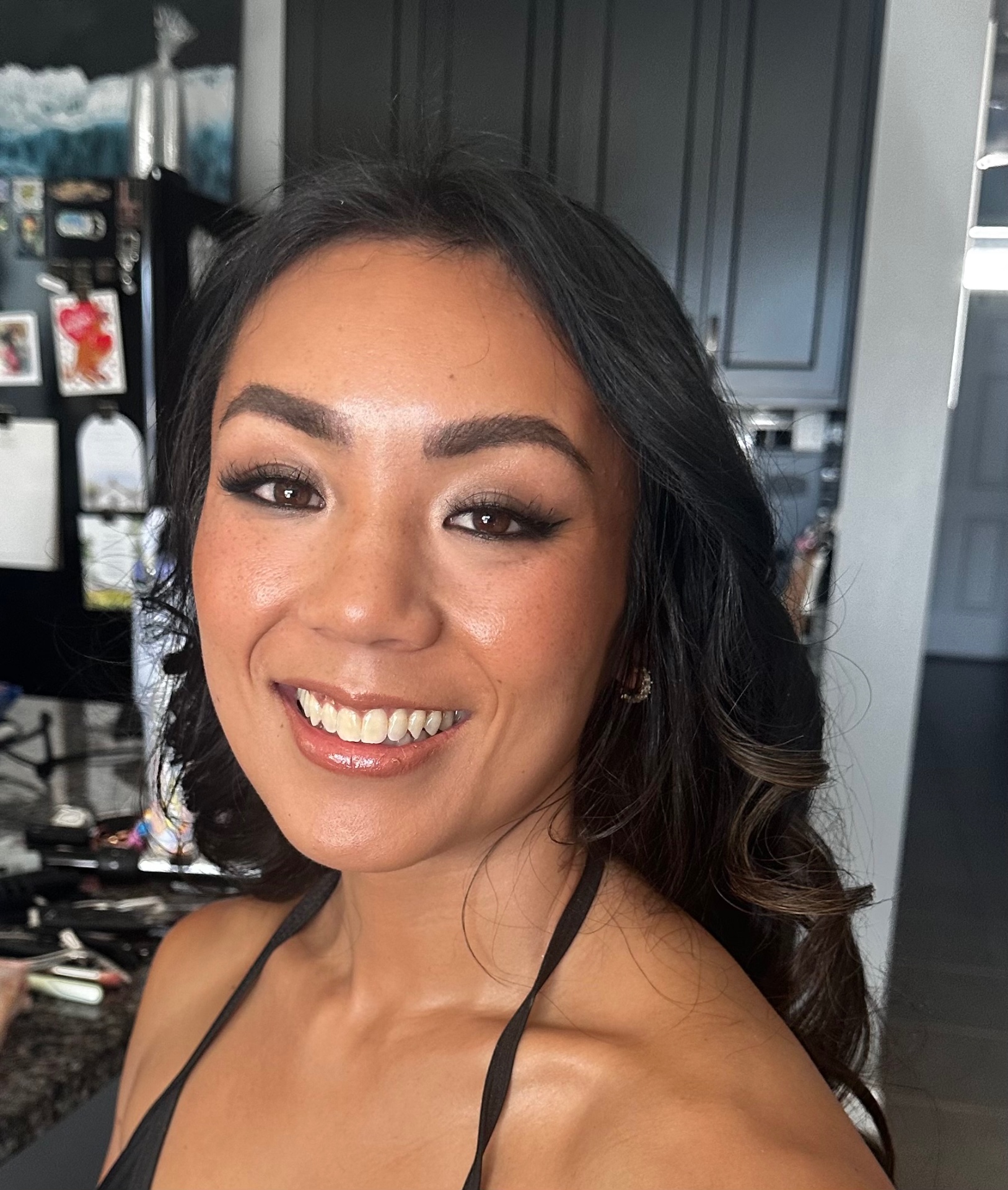 Warm neutral glam with soft curls